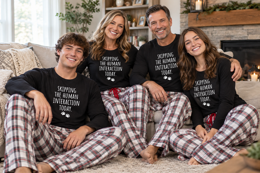 Plaid pajama pants in red, white, and gray with drawstring waist