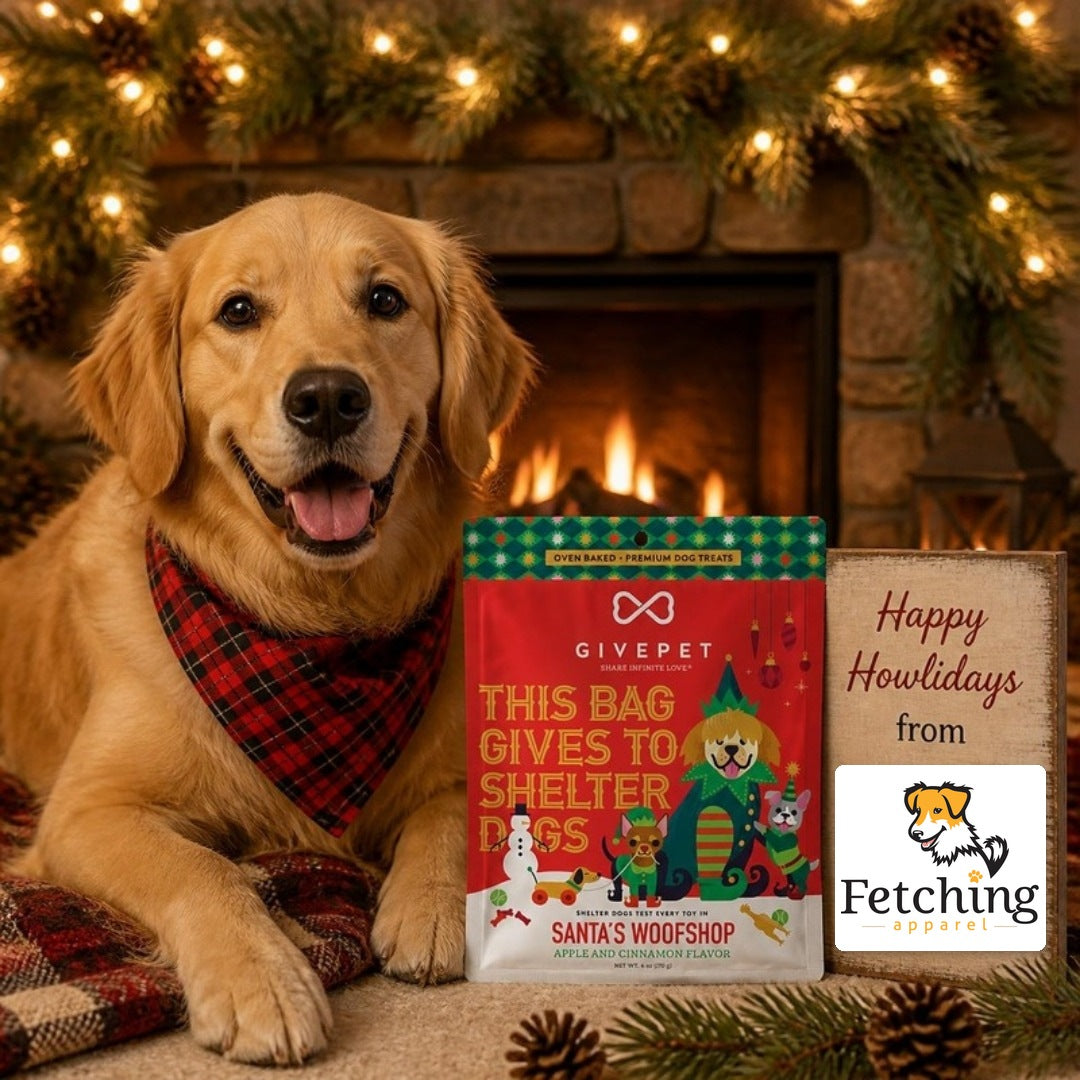 Golden retriever by the fireplace with a bag of Santa's Woofshop holiday dog treats and a Happy Howlidays sign with the Fetching Apparel logo