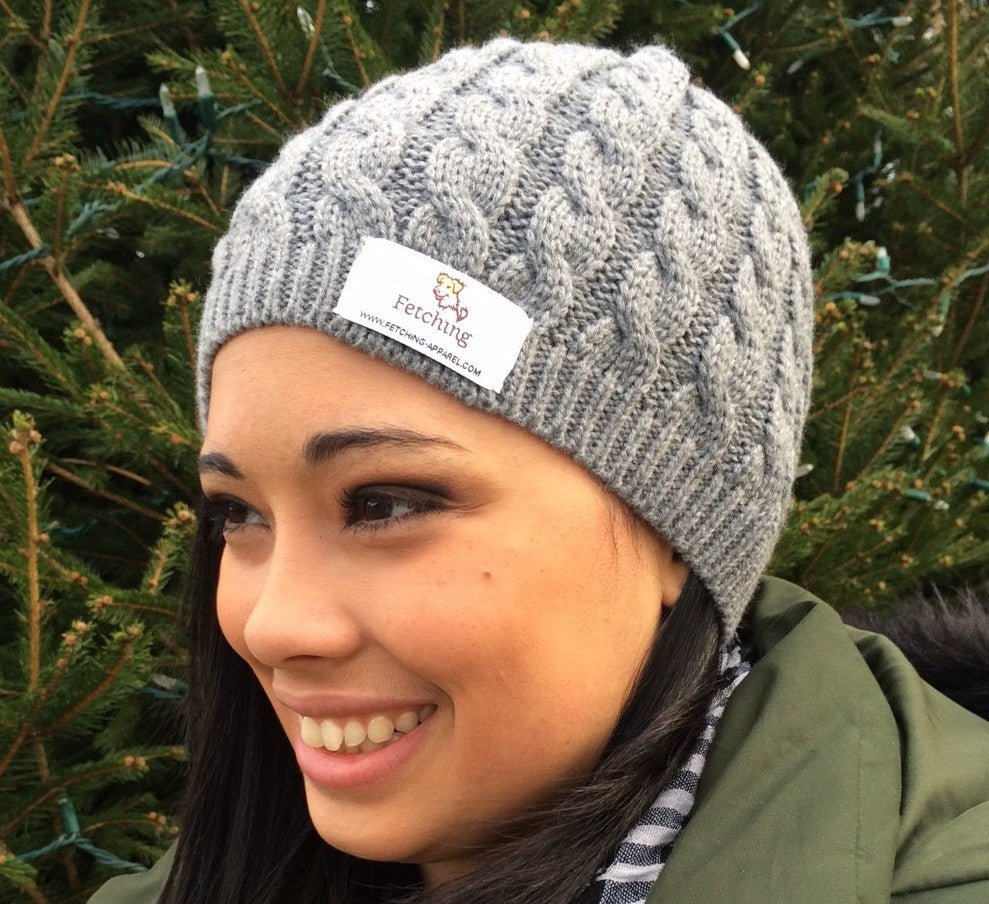 Fetching model Mandy Cordero is sporting the Fetching Apparel gray, knit cap. Your purchase will help homeless pets!